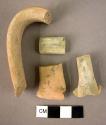 4 handle fragments, plain yellow ware