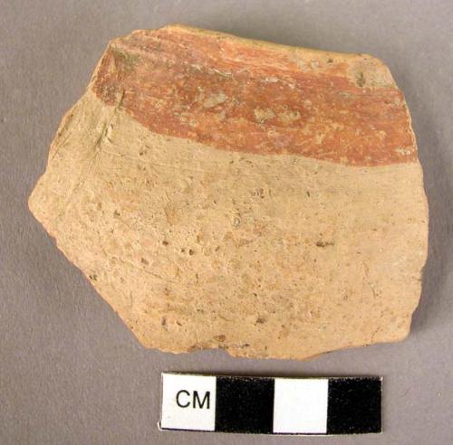 Ceramic rim sherd, buff with red stripe