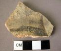 Potsherd - paint on creamy greenish slip