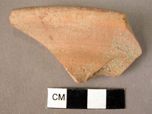 Rim potsherd - plain, reddish coarse ware, wheelmade, red glaze in interior