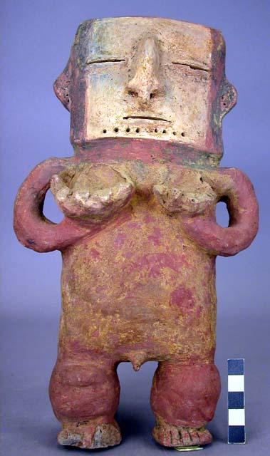 Terra cotta vase, grotesque human form