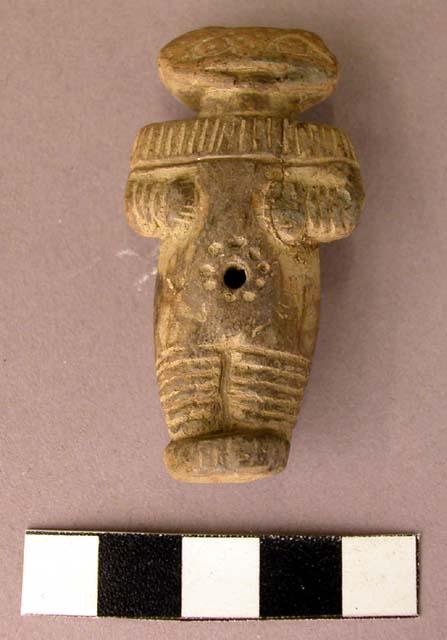 Pottery human effigy whistle