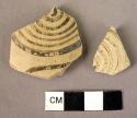 2 potsherds - Late Helladic imports, spiral design (note absence of central eye)