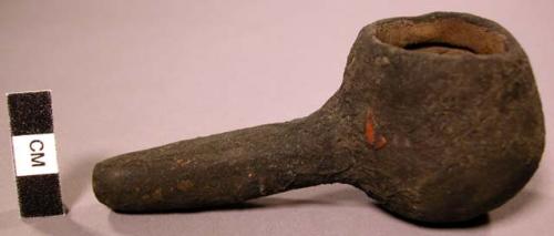 Navajo hunting pipe made of clay and painted black (male)