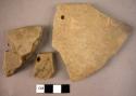 3 potsherds with perforations