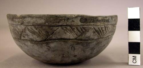 Ceramic bowl, small, black, band around rim of incised linear design