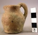 Small Etruscan coarse ware votive vase with handle