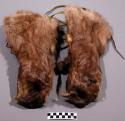 One pair of skin gloves--part of suit of skin clothing (36-64-10/6147-6157).