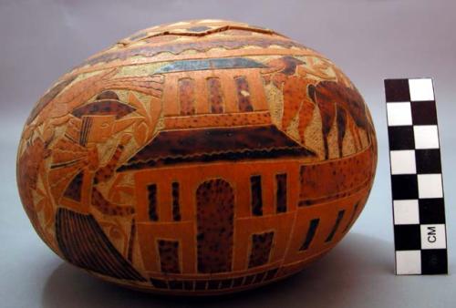 Gourd with cover and carved and painted designs of men with bulls and llamas