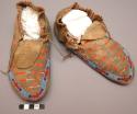 Pair of Sioux moccasins. Hard soles w/ leather uppers