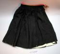 Woman's black woolen outer skirt - diagonal weave; gathered at top and+
