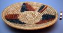 Basket tray with black and red design. vegetable dye