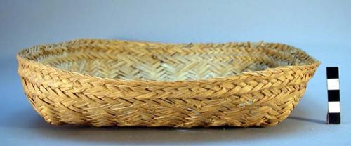 Basket, twill weave palm leaf, square base rises to round rim