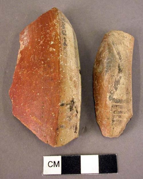 Pottery rim and rim sherd with perforated lug of flat spouted bowls