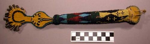 Beaded needle case (needles probably inside, but plugged w/ wood). Body o