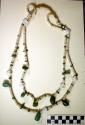 Navajo necklace. 2 strands of shell (heshe) beads and turquoise beads