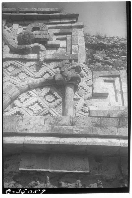 Serpent motif in architectural decoration,  East facade of West House, Monjas Qu