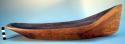 Toy, carved model canoe