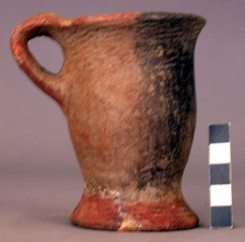 Mug, red- 4"h x 2 3/4" d at mouth