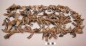Crow dance Bandolier. 1 strand of antelope hooves with red pigment