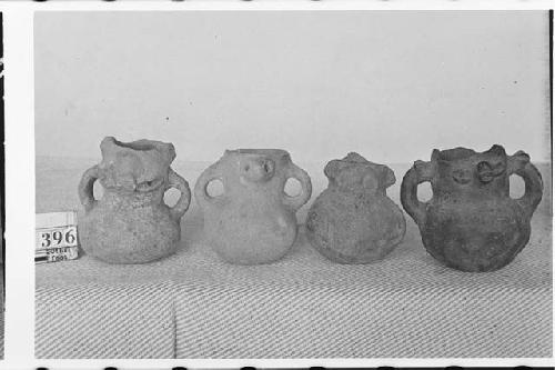 Four Small Pottery Jars