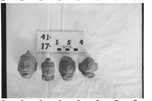 Four Solid Figurine Heads