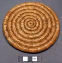 Coiled table mat