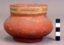Red pottery jar with polychrome neck