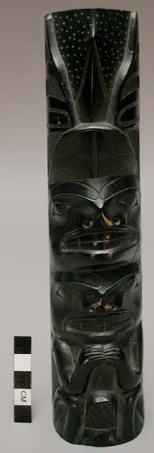 Carved argillite miniature pole