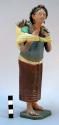 Painted clay figurine - woman carrying fruit (10")