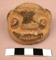 Pottery lug with animal features