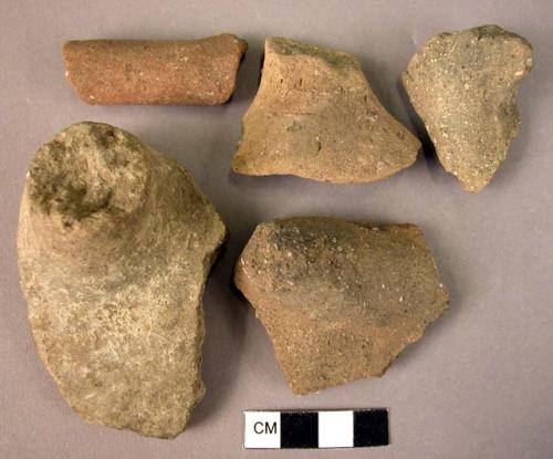 Pottery bowl rim and lug; 4 handle fragments