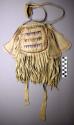 Pouch with heavy fringe (tobacco bag?). Made of buckskin.