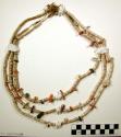 Navajo necklace. 3 strands of shell beads w/ larger pieces of shell, turquoise a