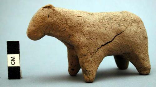 Unfired clay figurine depicting buck or sheep