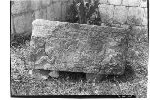 Sculptured stone found at west base of balustrade, north stairway of Mercado.