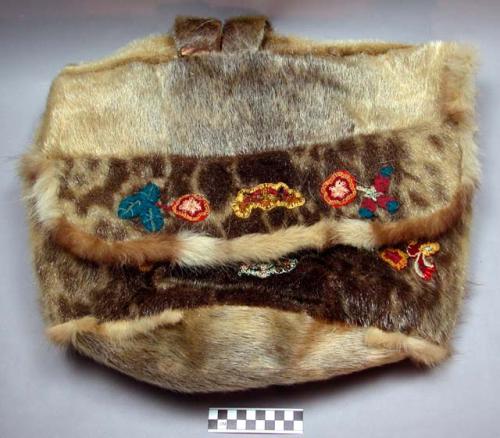 Embroidered fur rucksack