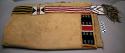 Saddle blanket--canvas with t-shaped beadwork in red, white, blue, and yellow
