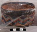 Oval basket with cover of birch bark, sweet grass. Quill decoration