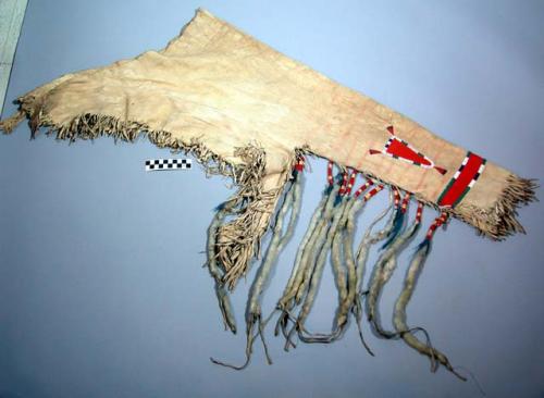 Pair of buckskin chaps, fringed. Decorated w/ weasel fur, beads and applique