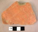 2 potsherds of white on red painted ware