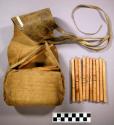 Gambling sticks and leather pouch