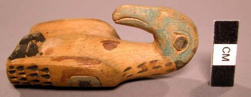 Small carved wooden bird