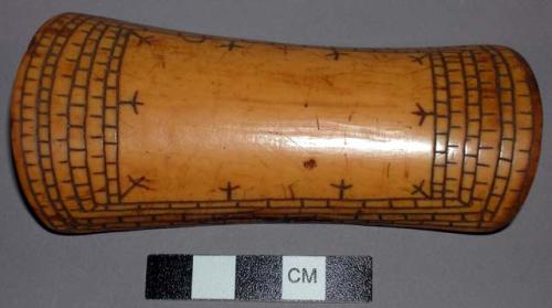 Ivory wrist guard, inscribed ornament