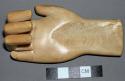 Hand of walrus tusk