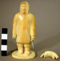 Ivory carving - man carrying a fox and a knife