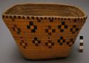 Trinket basket, imbricated design on coiling.
