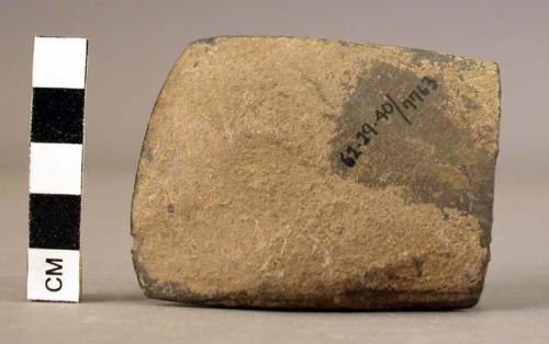Flat stone celt fragment