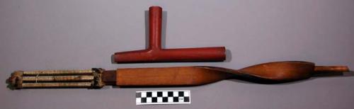 Teton Sioux pipe. Twisted wood stem. Rectangular in cross-section. Grid at mouth
