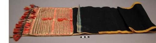 Teton Sioux garment, possibly a breech cloth. Blue flannel w/ hide attached on one